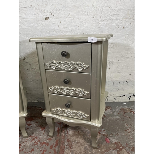 28 - A pair of French style silver painted bedside chests of three drawers