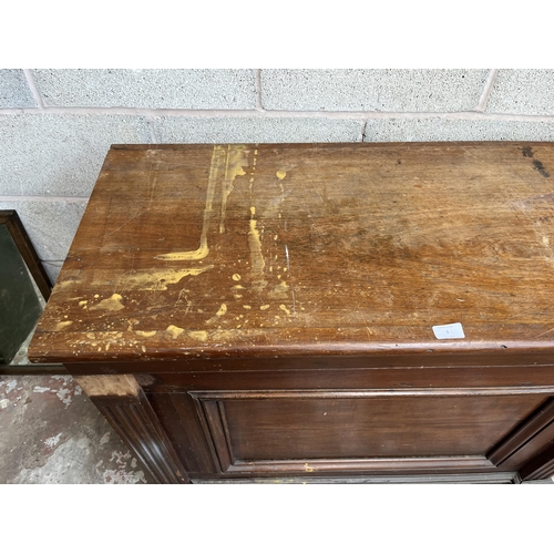 3 - A Victorian carved mahogany chiffonier sideboard