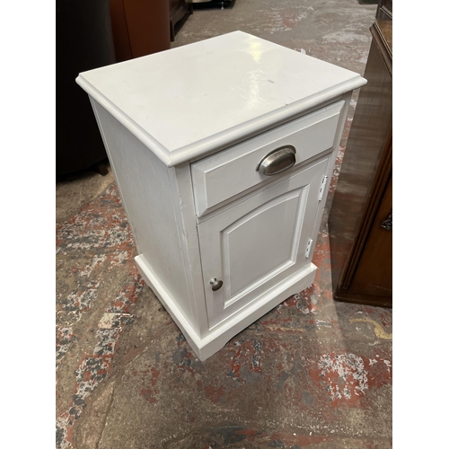 33 - Two bedside cabinets, one Austinsuite walnut and one white painted