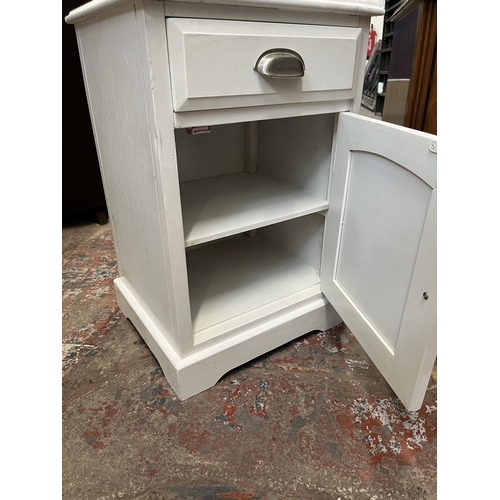 33 - Two bedside cabinets, one Austinsuite walnut and one white painted