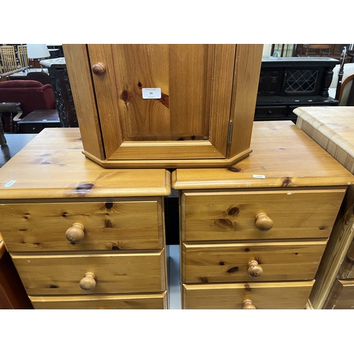 34 - Four pieces of pine furniture, one wall mountable corner cabinet and three bedside chests