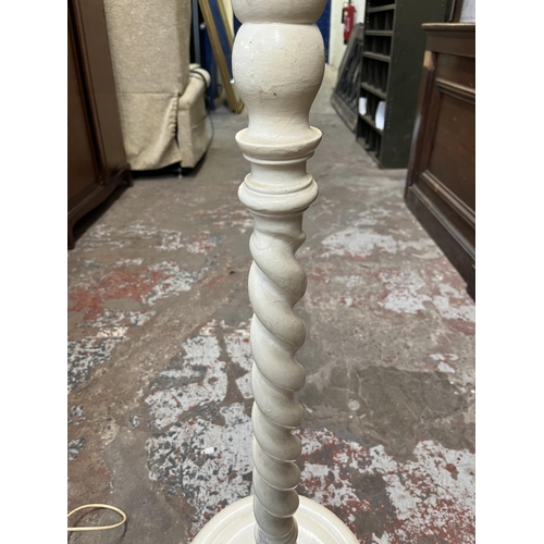 36 - A white painted barley twist standard lamp - approx. 154cm high