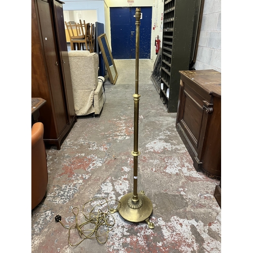 37 - A 19th century style brass tri-footed standard lamp - approx. 152cm high