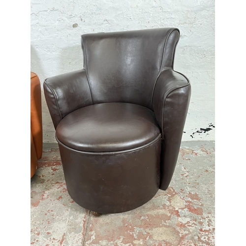 39 - Two modern leatherette tub chairs