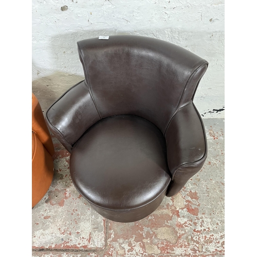 39 - Two modern leatherette tub chairs