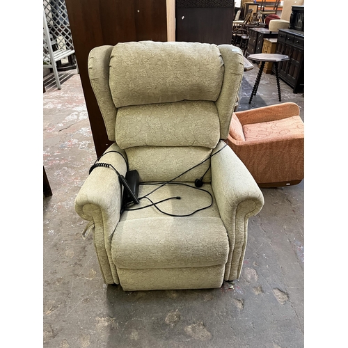 40B - A modern fabric upholstered electric reclining armchair with remote and power supply