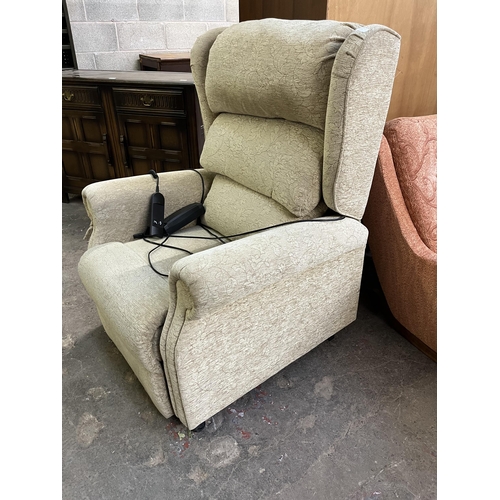 40B - A modern fabric upholstered electric reclining armchair with remote and power supply