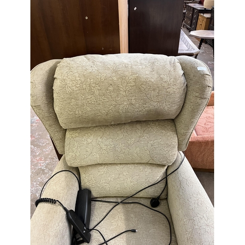 40B - A modern fabric upholstered electric reclining armchair with remote and power supply