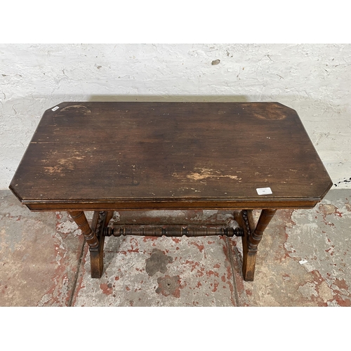 42 - A Victorian Aesthetic Movement mahogany side table with lower stretcher