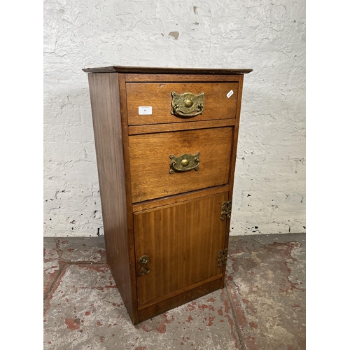 44 - A mahogany bedside cabinet with two drawers and single cupboard door