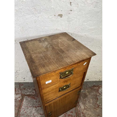 44 - A mahogany bedside cabinet with two drawers and single cupboard door