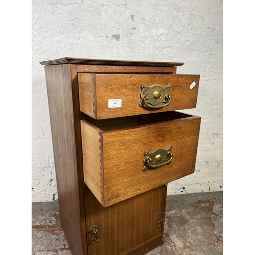 44 - A mahogany bedside cabinet with two drawers and single cupboard door