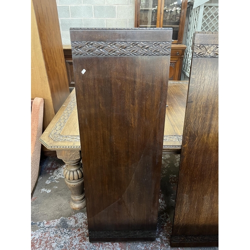 45 - A Victorian carved oak wind out dining table with four leaves - approx. 76cm high x 137cm wide x 220... 