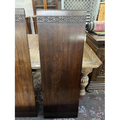 45 - A Victorian carved oak wind out dining table with four leaves - approx. 76cm high x 137cm wide x 220... 