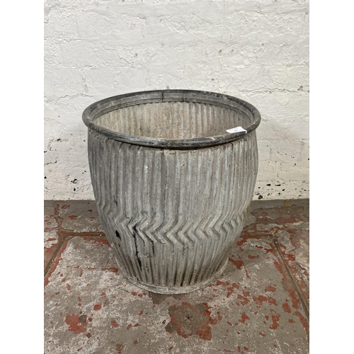 46 - A galvanised dolly tub - approx. 48cm high x 44cm diameter