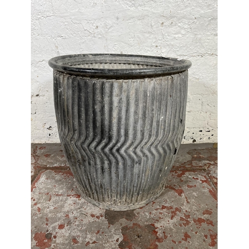 46 - A galvanised dolly tub - approx. 48cm high x 44cm diameter