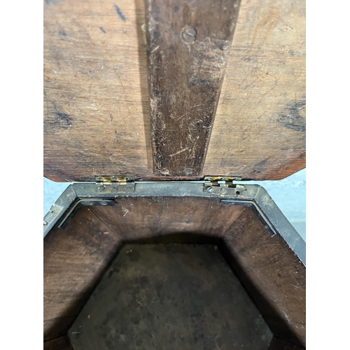 49 - A late 19th/early 20th century Anglo Indian carved mahogany hexagonal side table with hinged lid