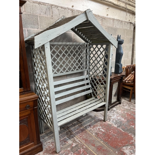 5 - A grey painted wooden two seater garden arbour bench - approx. 208cm high x 157cm wide x 68cm deep