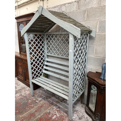 5 - A grey painted wooden two seater garden arbour bench - approx. 208cm high x 157cm wide x 68cm deep