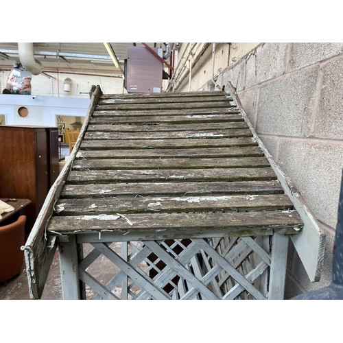 5 - A grey painted wooden two seater garden arbour bench - approx. 208cm high x 157cm wide x 68cm deep