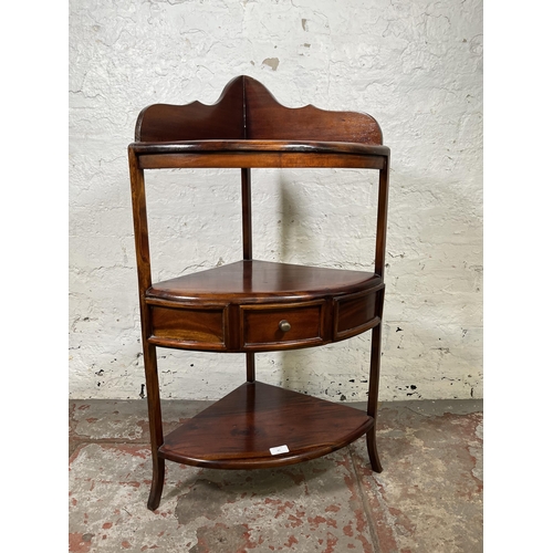 61 - A Georgian style mahogany three tier corner washstand with single drawer - approx. 95cm high x 53cm ... 