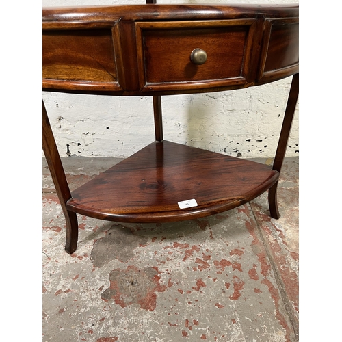 61 - A Georgian style mahogany three tier corner washstand with single drawer - approx. 95cm high x 53cm ... 