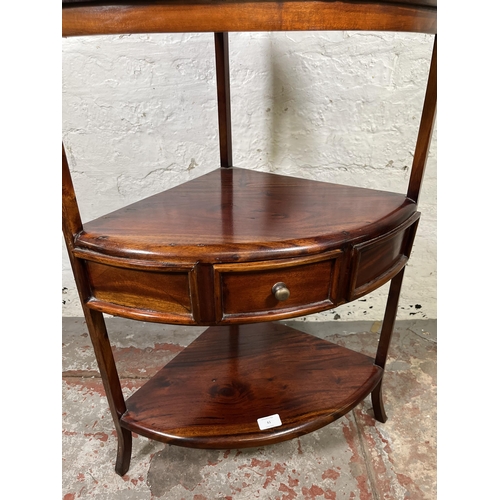 61 - A Georgian style mahogany three tier corner washstand with single drawer - approx. 95cm high x 53cm ... 