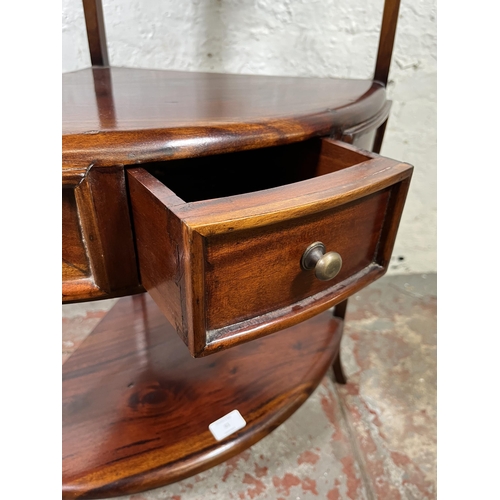 61 - A Georgian style mahogany three tier corner washstand with single drawer - approx. 95cm high x 53cm ... 