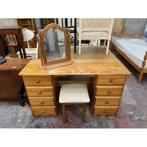 66 - A pine dressing table with mirror and stool