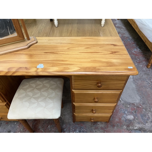 66 - A pine dressing table with mirror and stool