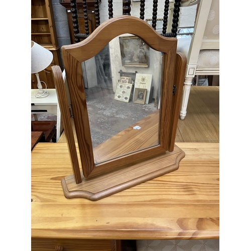 66 - A pine dressing table with mirror and stool