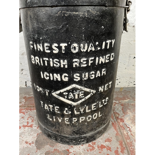 67 - A vintage Tate & Lyle Ltd Liverpool black and white painted galvanised icing sugar bin