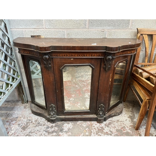 7 - A Victorian inlaid walnut credenza with three mirrored glass cupboard doors