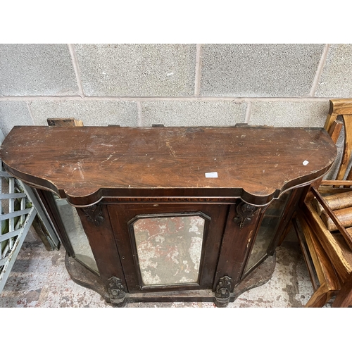 7 - A Victorian inlaid walnut credenza with three mirrored glass cupboard doors