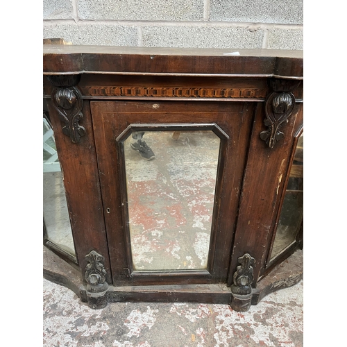 7 - A Victorian inlaid walnut credenza with three mirrored glass cupboard doors