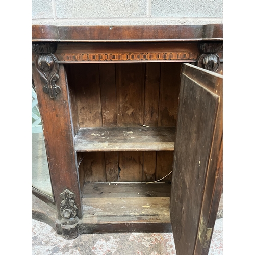 7 - A Victorian inlaid walnut credenza with three mirrored glass cupboard doors