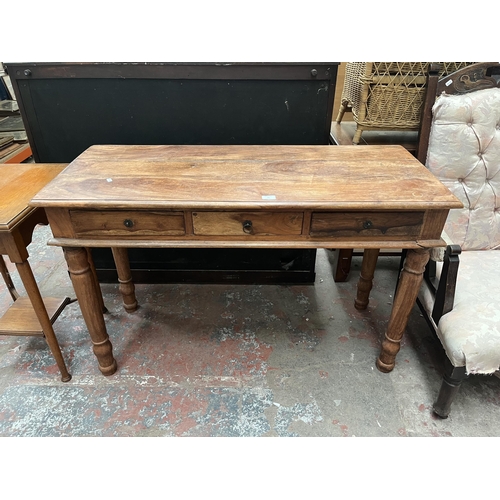 71 - An Indian sheesham wood console table