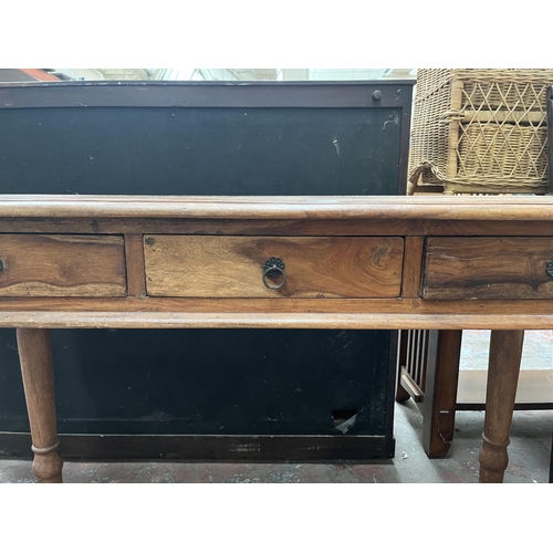 71 - An Indian sheesham wood console table