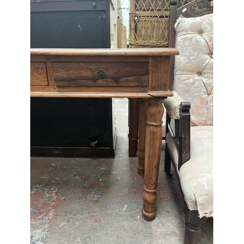 71 - An Indian sheesham wood console table