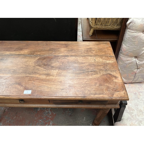 71 - An Indian sheesham wood console table