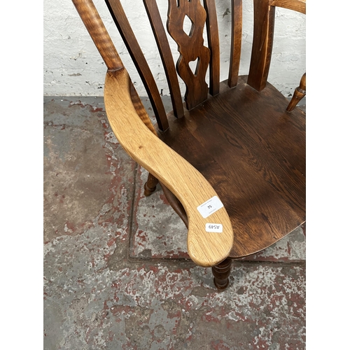 75 - An elm farmhouse grandfather chair