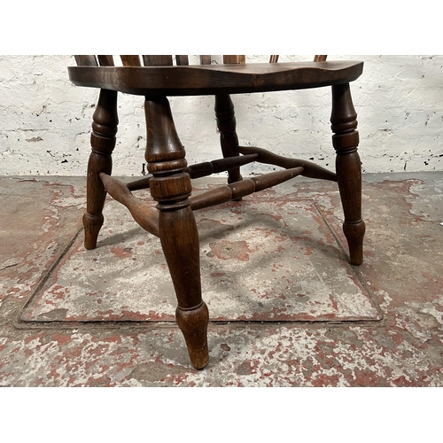 75 - An elm farmhouse grandfather chair