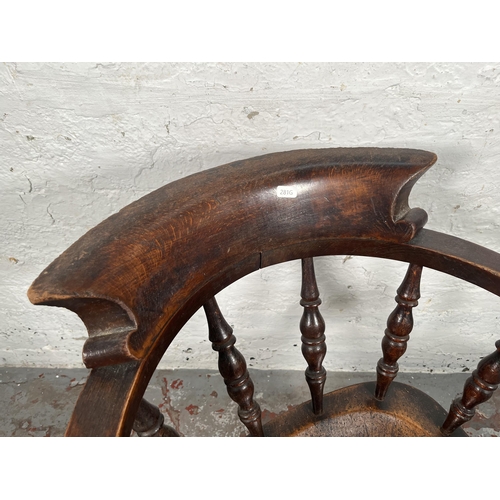 77 - A Victorian elm and beech smoker's bow chair