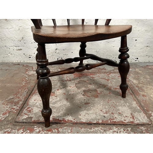 77 - A Victorian elm and beech smoker's bow chair