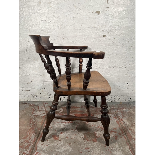 77 - A Victorian elm and beech smoker's bow chair