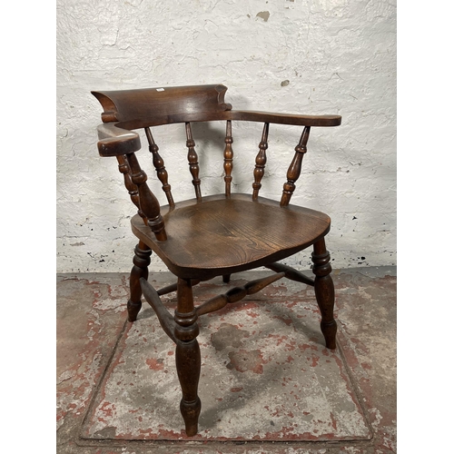 78 - A Victorian elm and beech smoker's bow chair