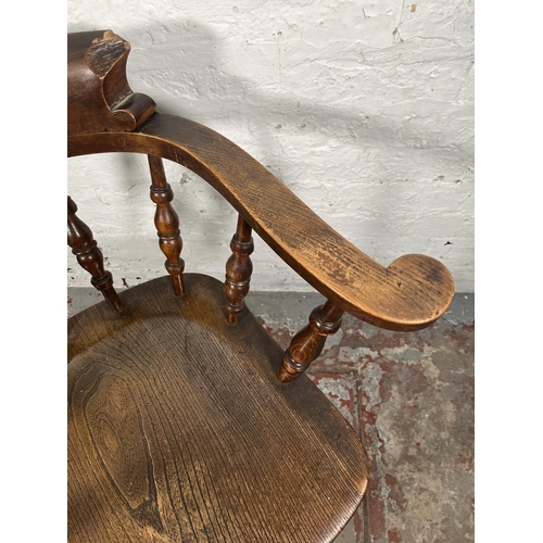 78 - A Victorian elm and beech smoker's bow chair