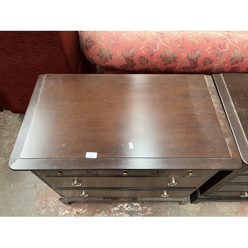 79 - A Stag Minstrel mahogany chest of three short over two long drawers