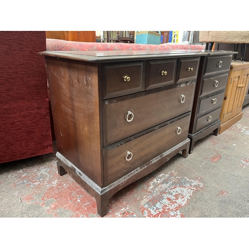 79 - A Stag Minstrel mahogany chest of three short over two long drawers