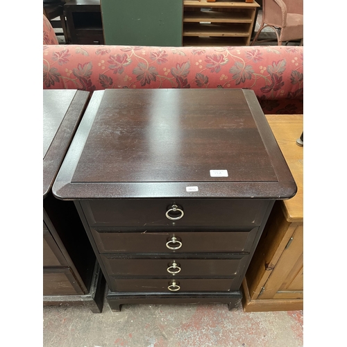 79A - A Stag Minstrel mahogany bedside chest of four drawers